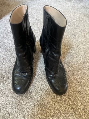 CHANEL Black Leather Ankle Boots with Embossed CC